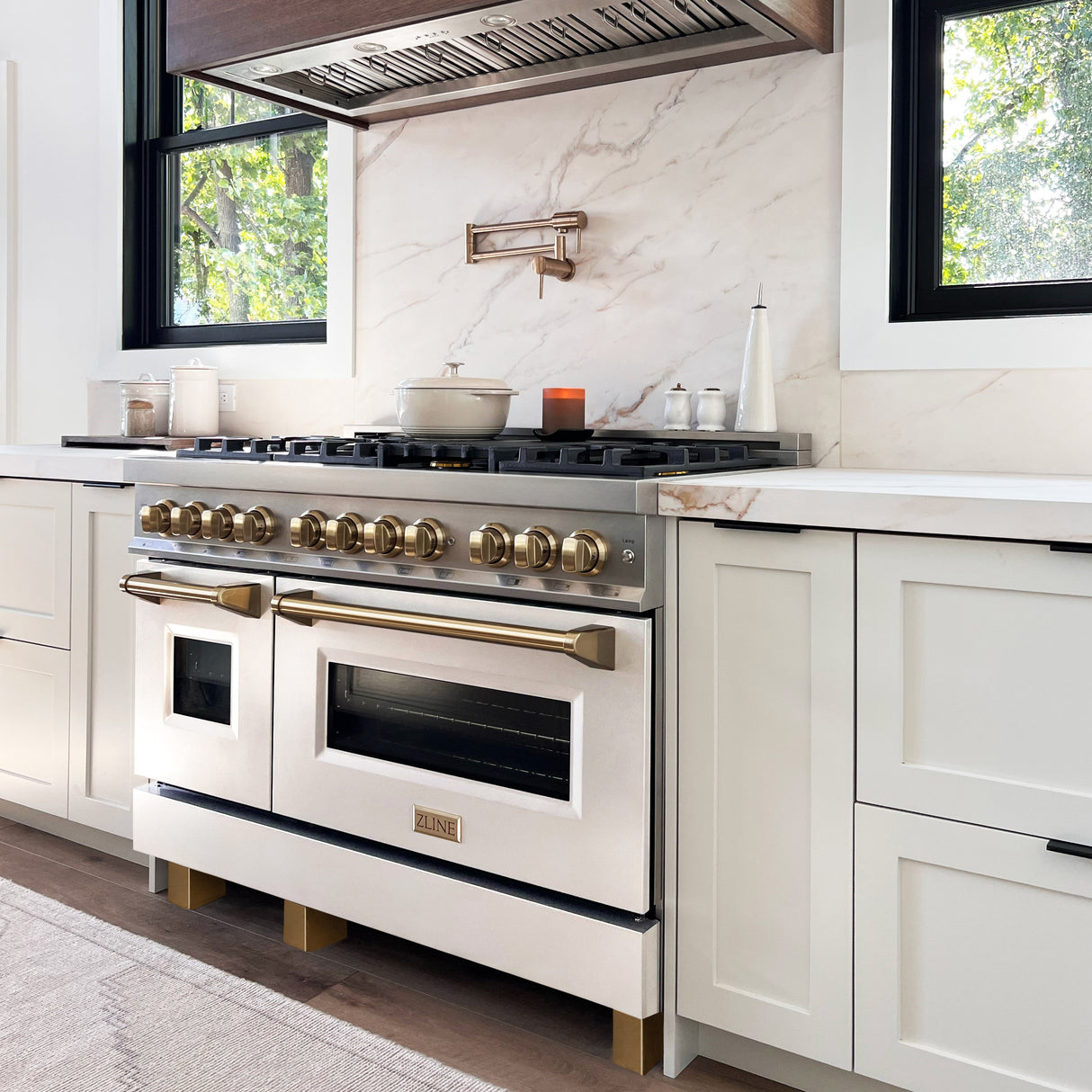 ZLINE Autograph Edition 48 in. 6.0 cu. ft. Legacy Dual Fuel Range with 7 Burner Gas Cooktop and 2 Electric Ovens in Stainless Steel with White Matte Doors and Champagne Bronze Accents (RAZ-WM-48-CB)